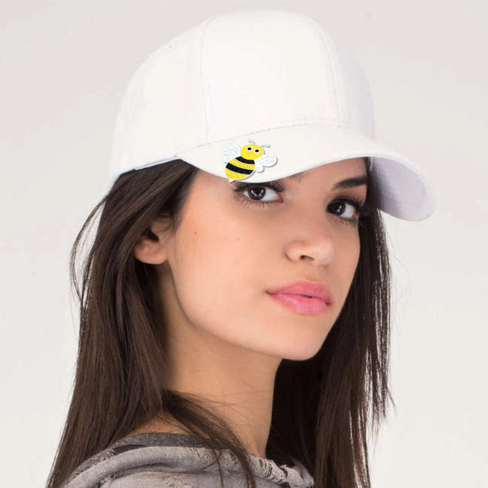 crystal wings on bumble bee worn on white hat