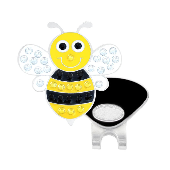 A golf ball marker shaped like a cartoon bee, featuring a yellow and black striped body with rhinestone-embellished wings and a black magnetic clip on a silver base, shown against a plain white background