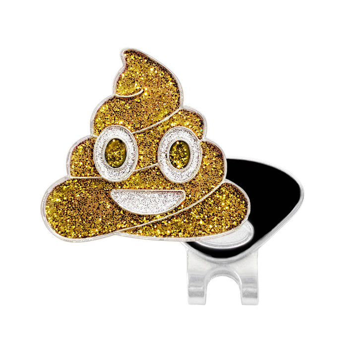 Gold glittery Navika golf marker poop emoji with a black base on a white background