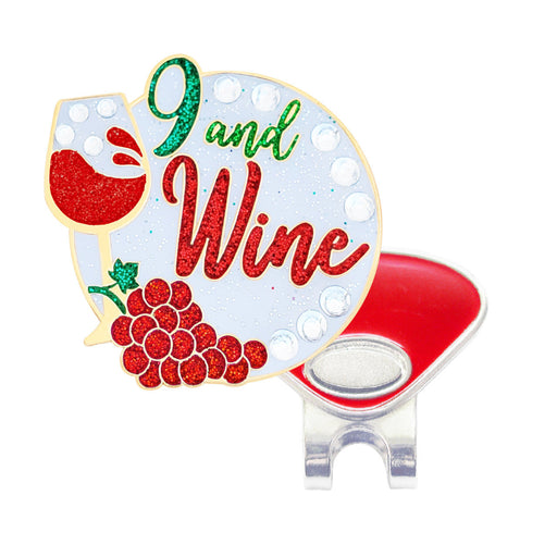 Golf ball marker with '9 and Wine' text, red grapes, and a golf ball on a white background