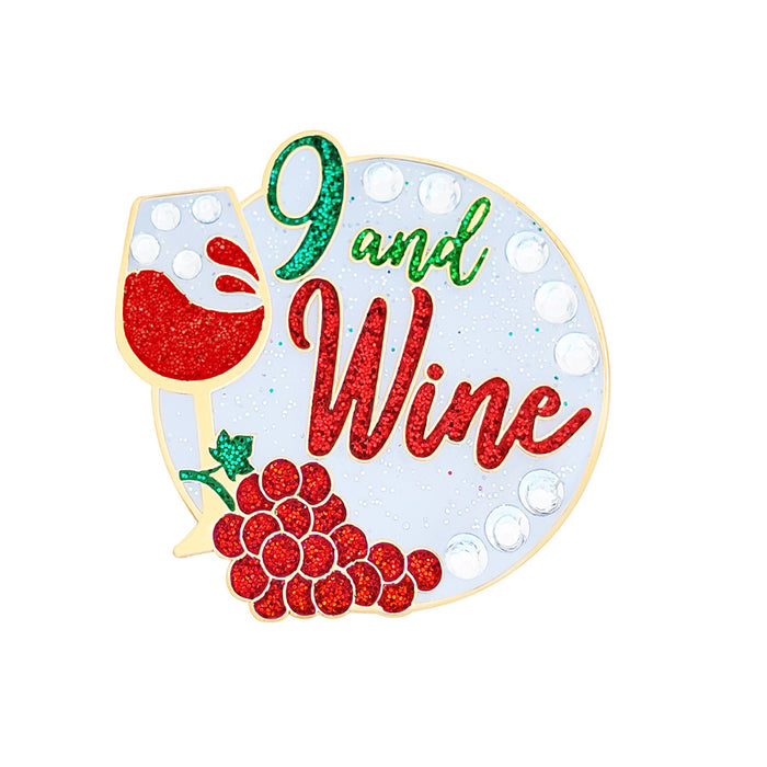 Decorative sign with '9 and Wine' text, wine glass, and grapes on a white background