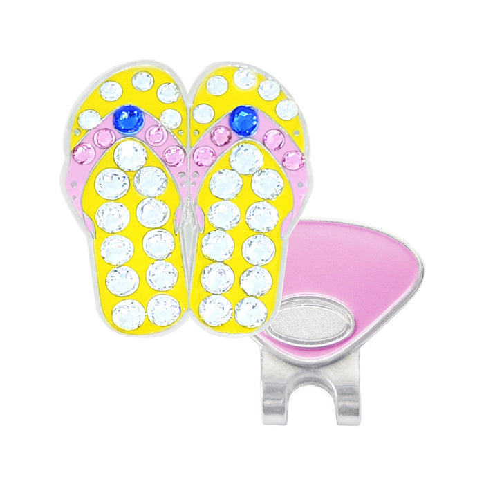Flip-flop design with crystals and a magnetic clip on a white background