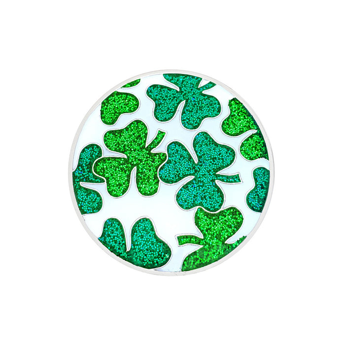 Green glittery shamrock design on a white background