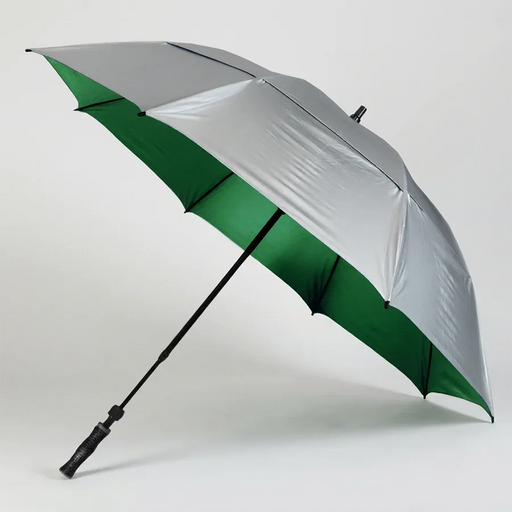 A golf umbrella with a metallic silver exterior and a green interior, shown open on a light gray background.