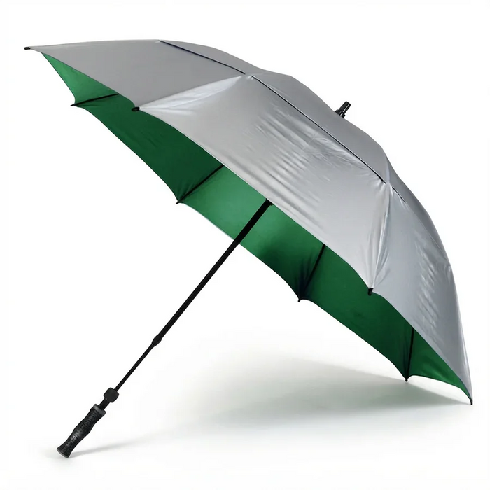 A golf umbrella with a metallic silver exterior and a dark green interior, shown open on a white background.