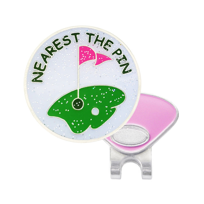 Golf accessory with 'Nearest the Pin' text and golf course design on a white background