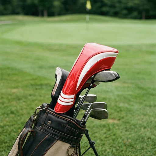 Red and white headcover with carbon fibre texture in a golf bag on a golf course
